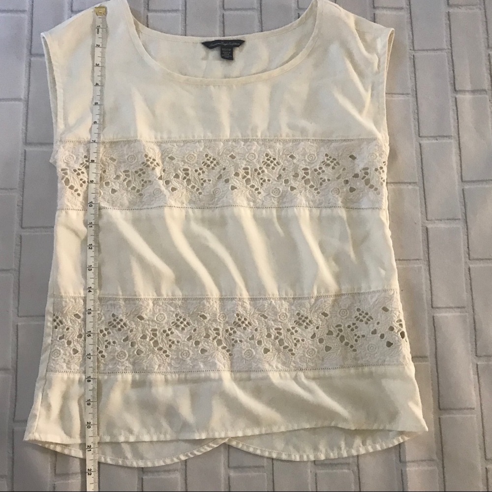 American Eagle laser cut lace insert top
